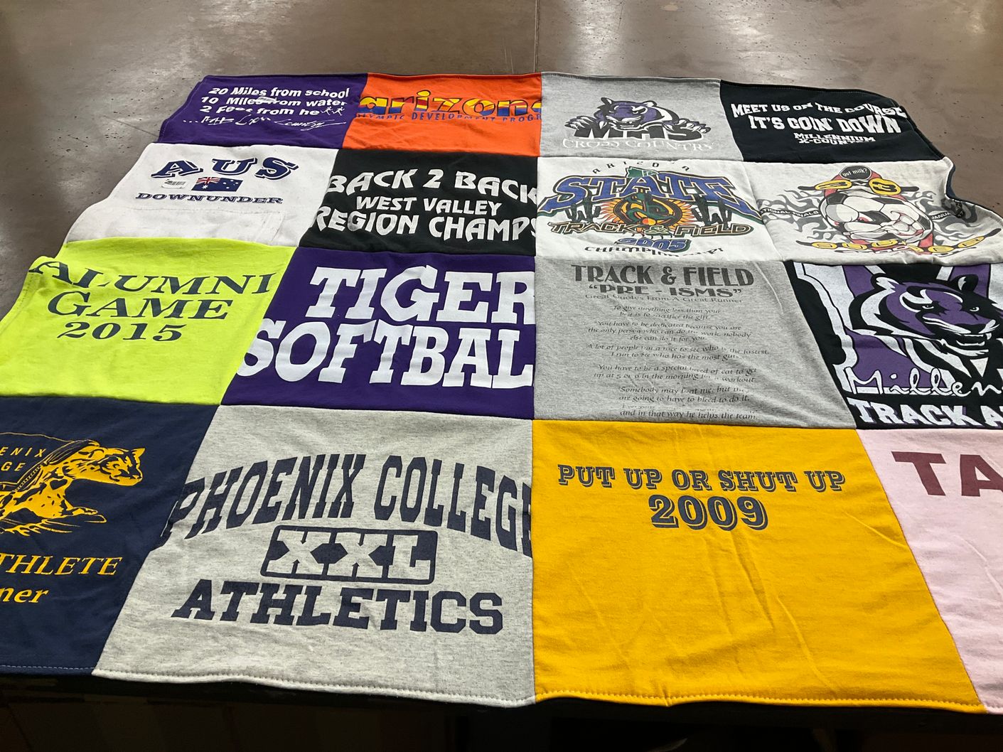 T-shirt quilt featuring state university track and field, middle school track and field by Sonja from AZ