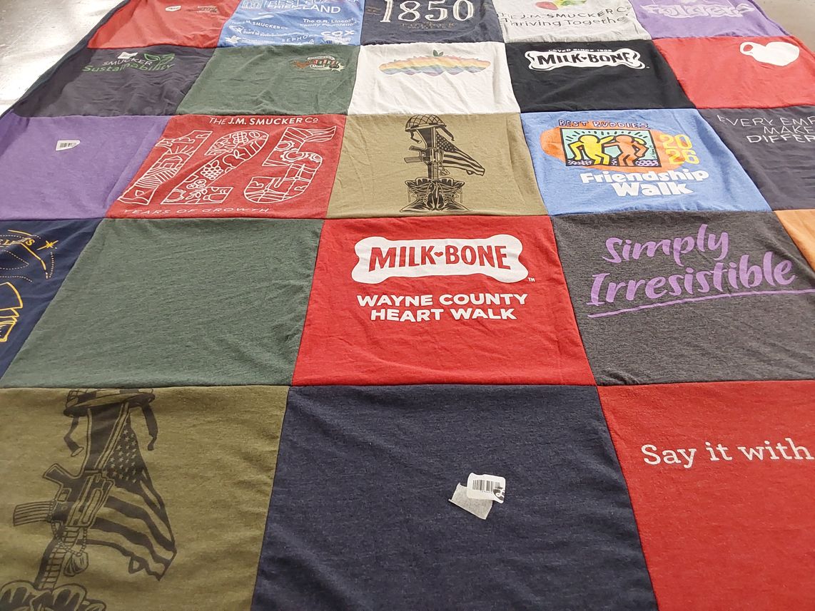 T-shirt quilt with community, charity themes by Kayla from OH