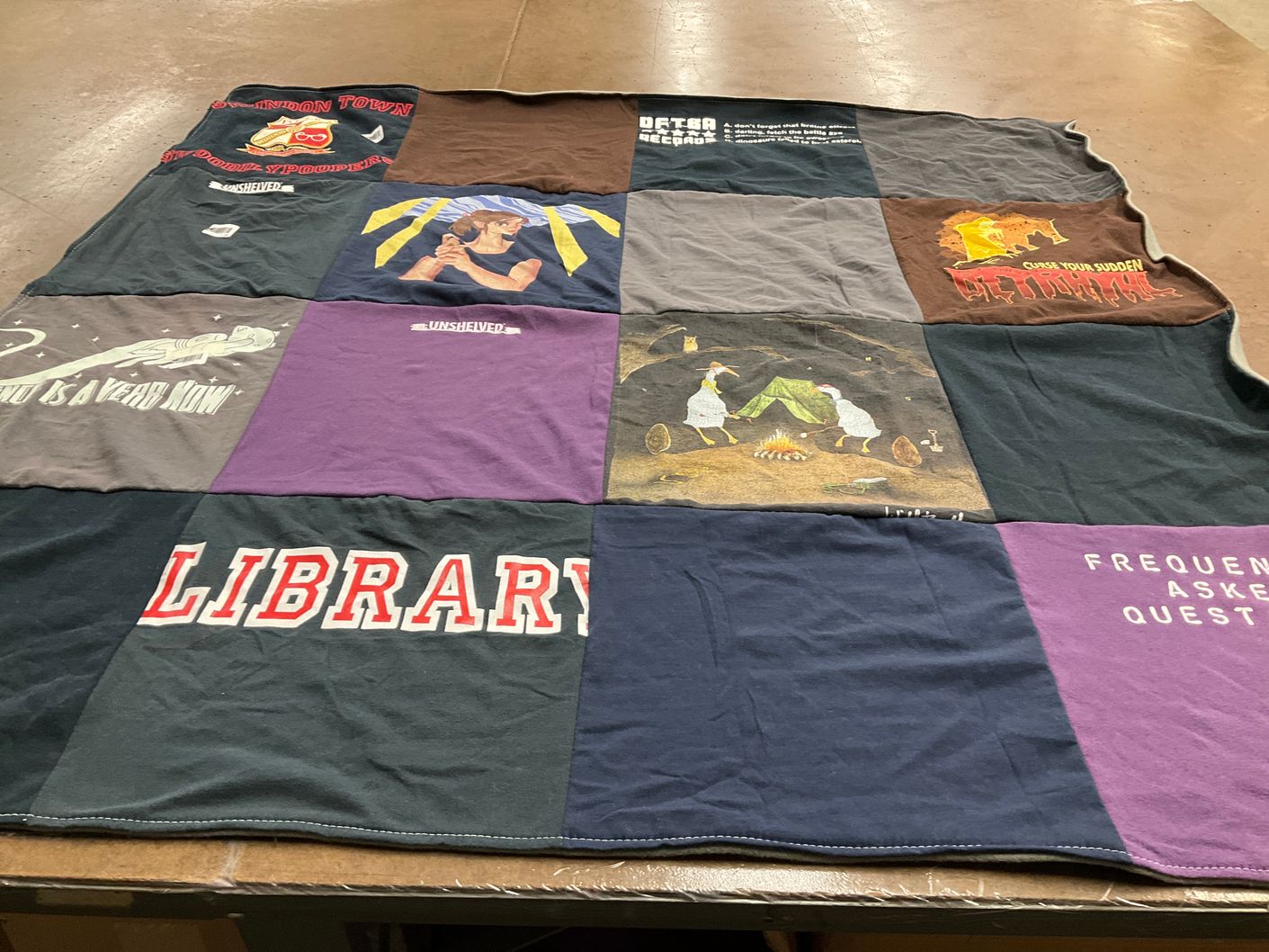 T-shirt quilt with reading, libraries themes by Kris from NC