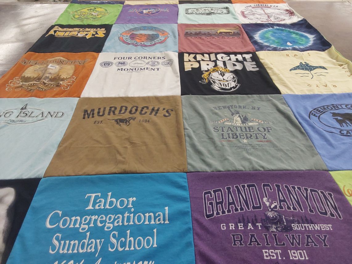 T-shirt quilt with travel, history themes by Sharon  from IA