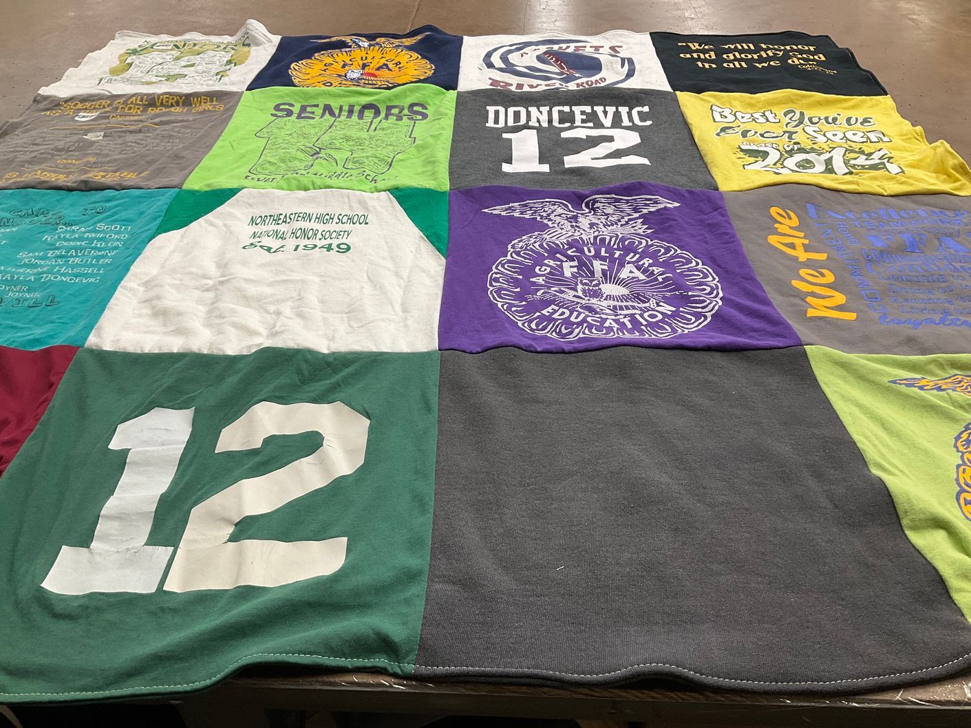 T-shirt quilt from northeastern high school by Joy from AZ