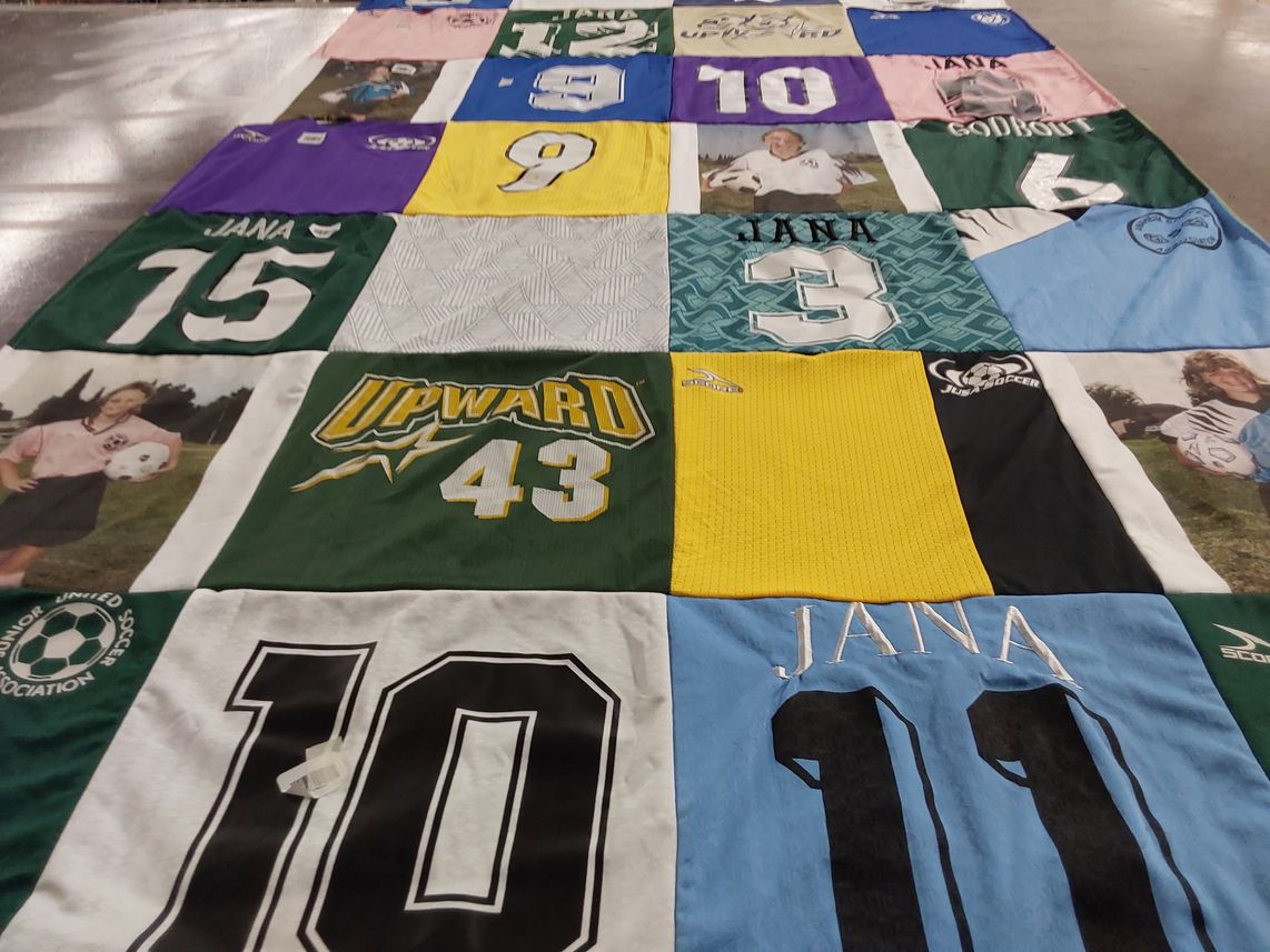 T-shirt quilt with sports, soccer themes by Kathleen from CA
