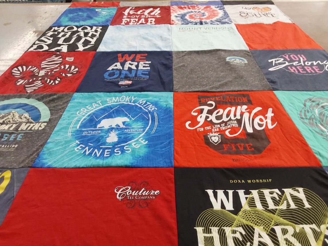 T-shirt quilt with outdoor, adventure themes by Patricia from LA