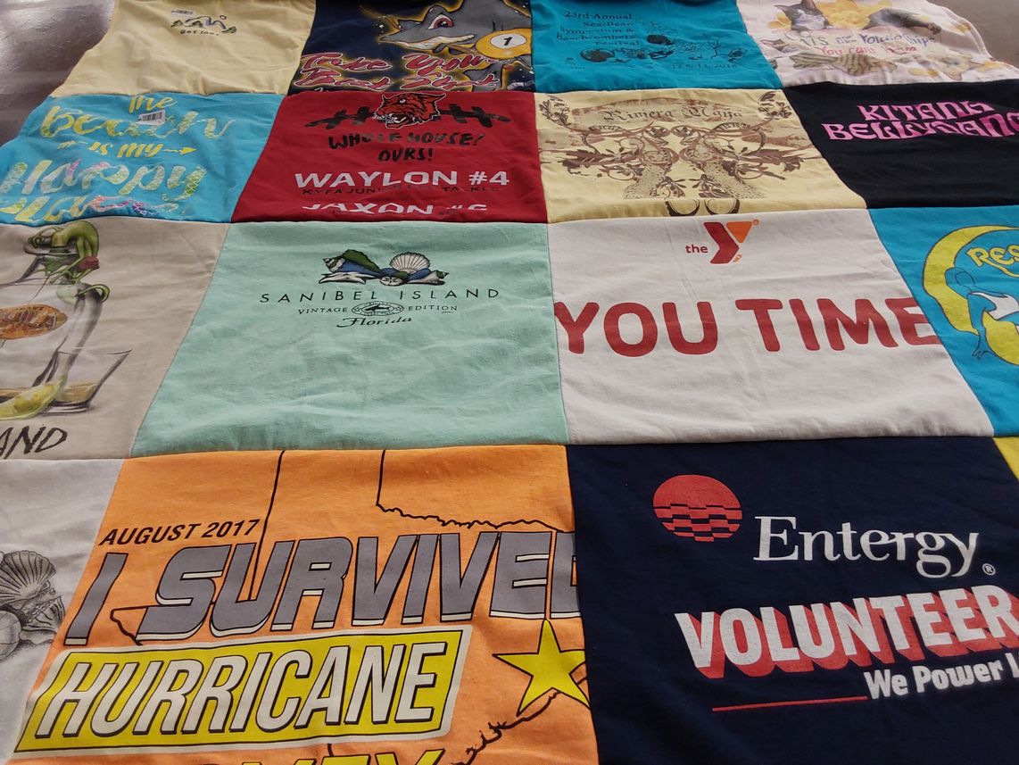 T-shirt quilt with travel, volunteering themes by Michelle from TX