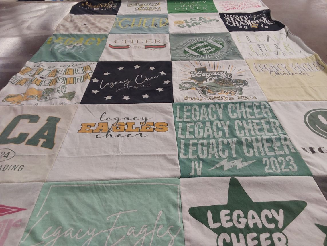 T-shirt quilt with cheerleading themes by nancy from TX