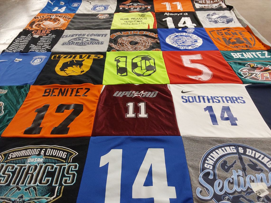 T-shirt quilt with sports, swimming themes by Kristen from OH