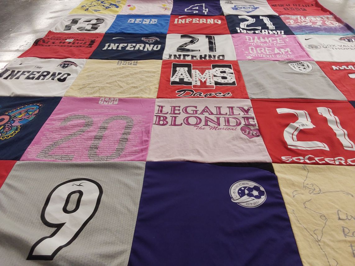 T-shirt quilt with dance, theater themes by Kristin from IL