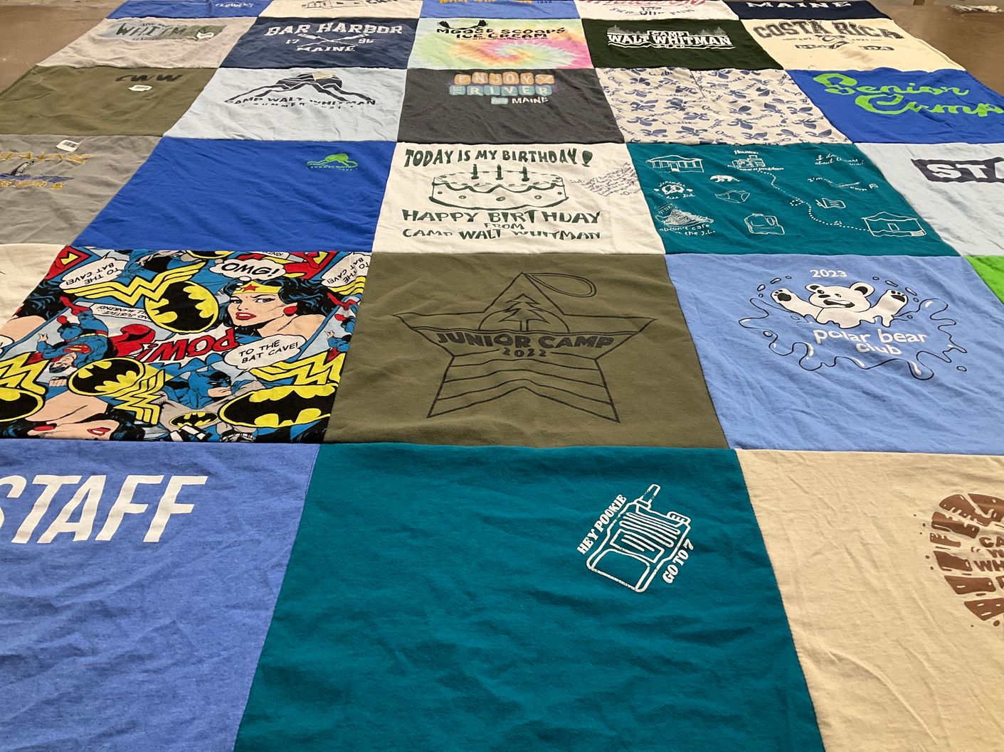 T-shirt quilt with camping, celebrations themes by Stefanie from NH