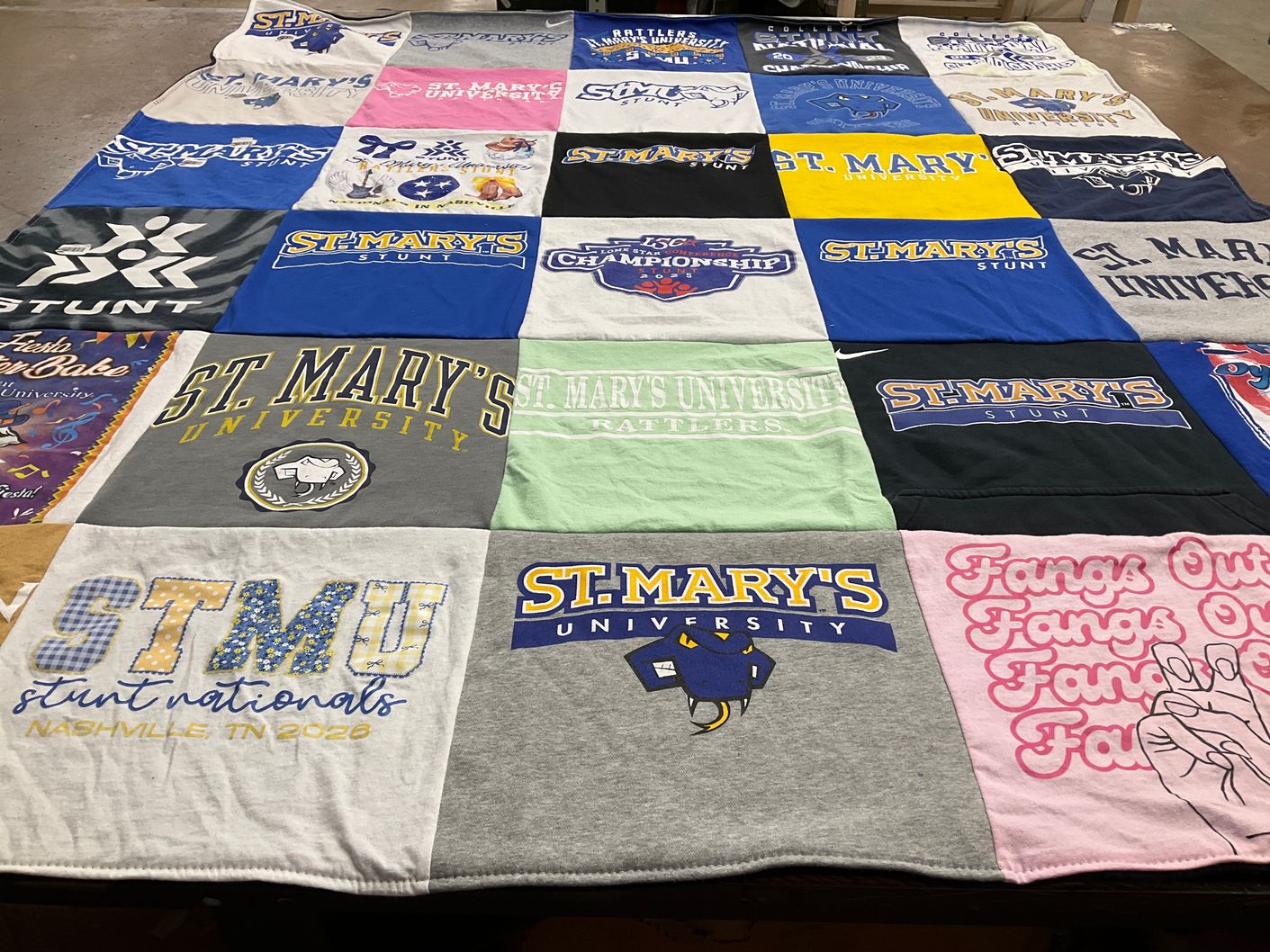 T-shirt quilt featuring st. mary's university stunt team by Kailey from TX