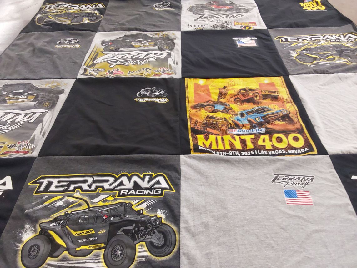 T-shirt quilt with off-road, racing themes by Denise from NV