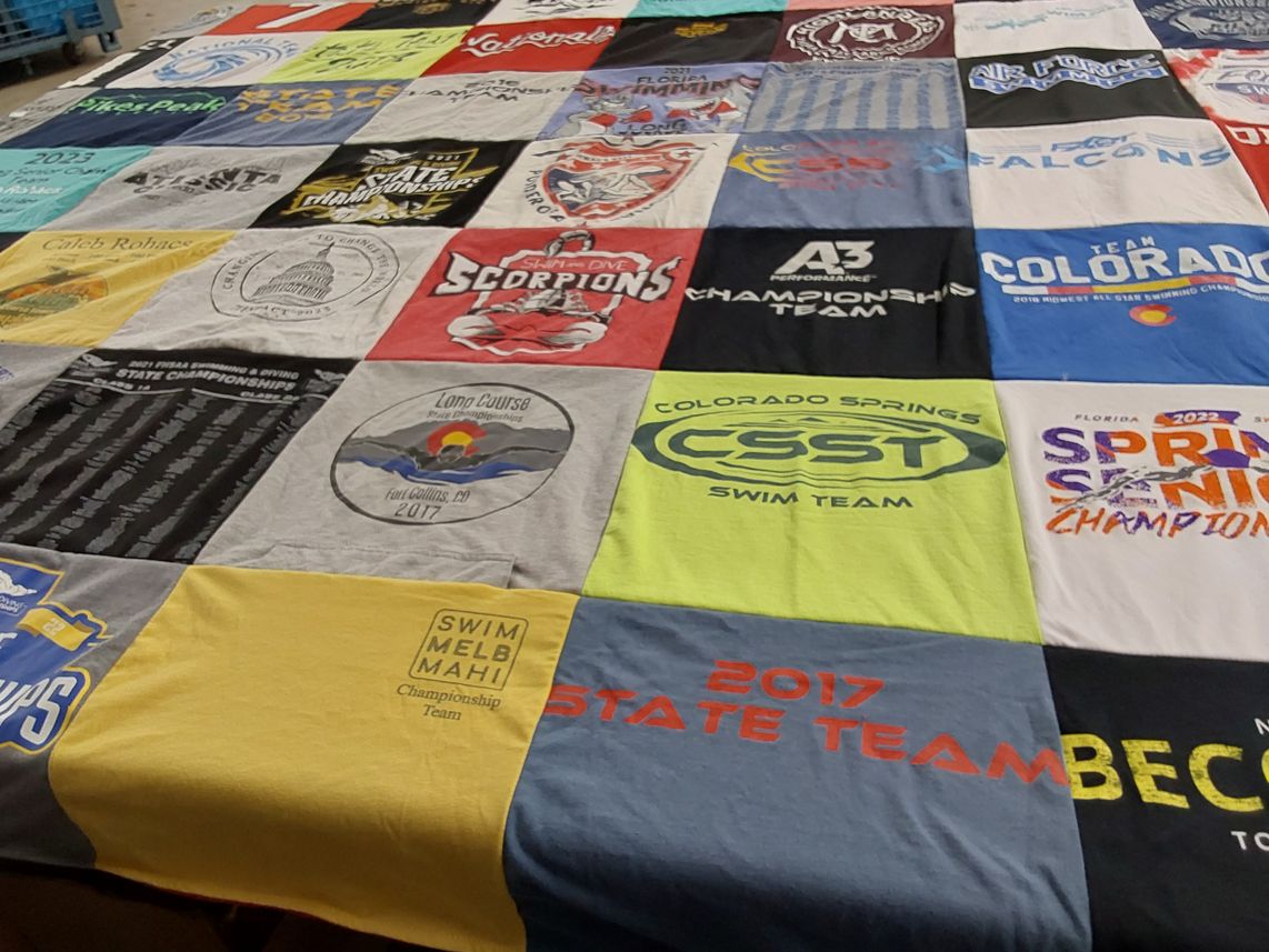 T-shirt quilt featuring colorado springs swim team by Lisa from FL