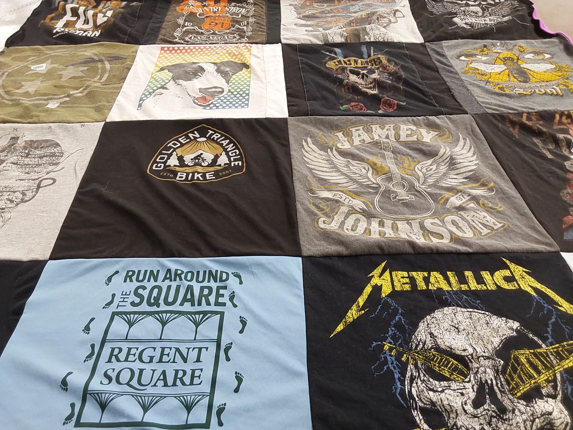 T-shirt quilt with biking, music themes by Jennifer from PA