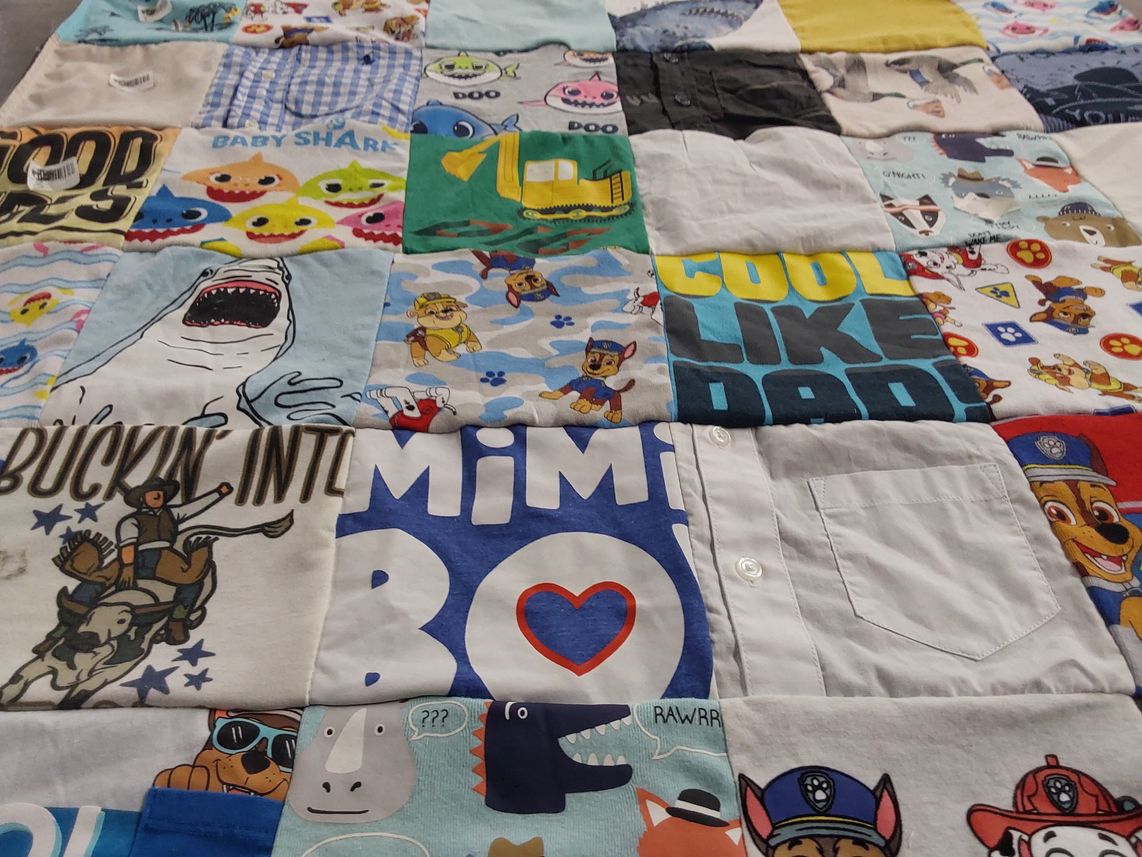 T-shirt quilt with cartoons, animals themes by Lori from LA