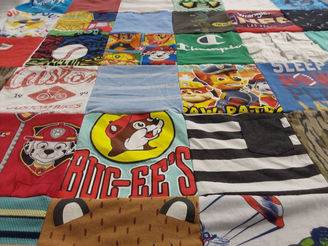 T-shirt quilt with children's entertainment, outdoor activities themes by Lori from LA