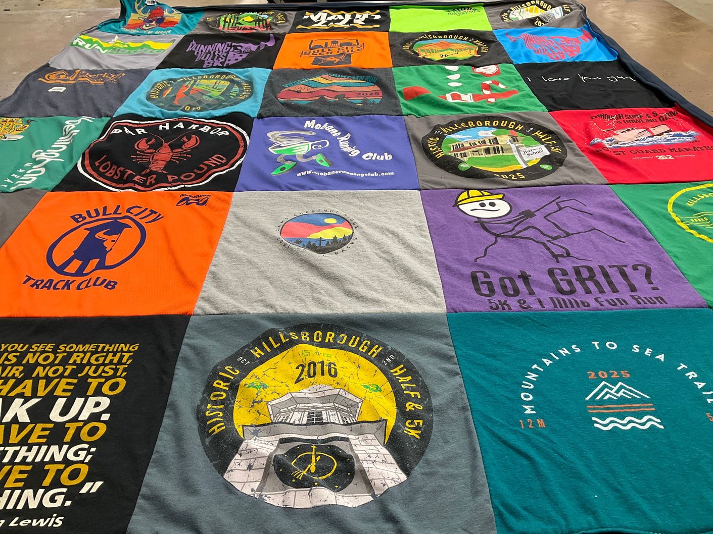 T-shirt quilt with running, trails themes by Bruce from NC