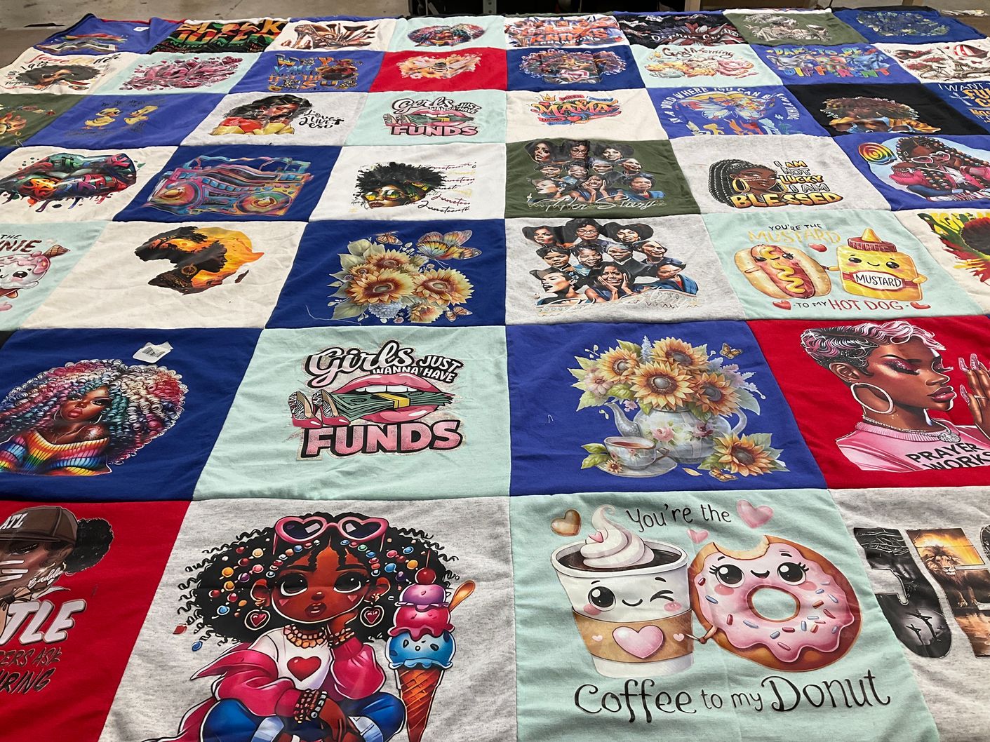 T-shirt quilt with art, music themes by Daphne from GA