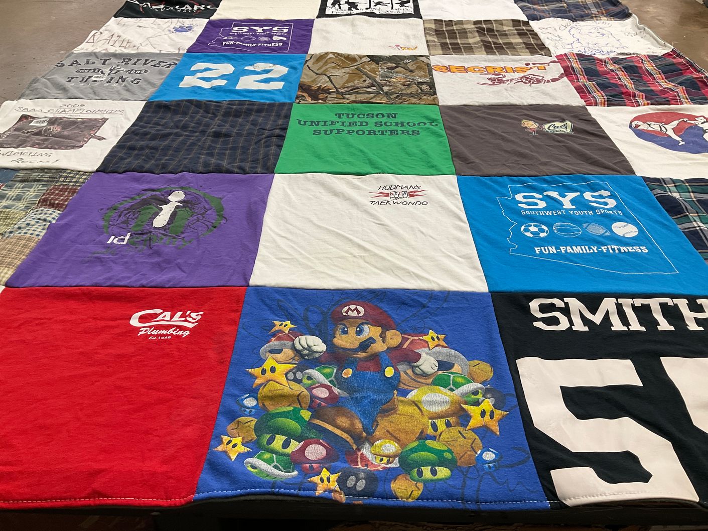 T-shirt quilt with sports, taekwondo themes by Lindsay from AZ