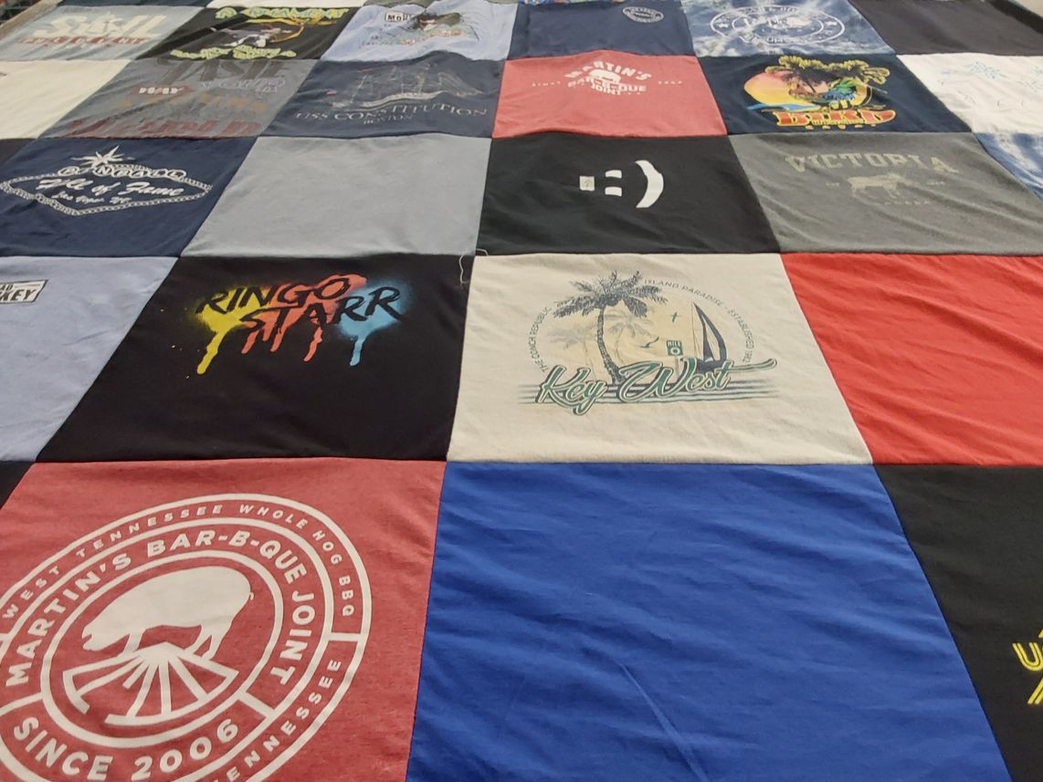T-shirt quilt with music, food themes by James from NJ