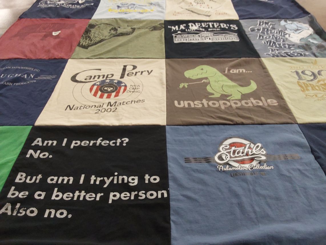 T-shirt quilt with shooting sports, automotive themes by KATHERINE from MI