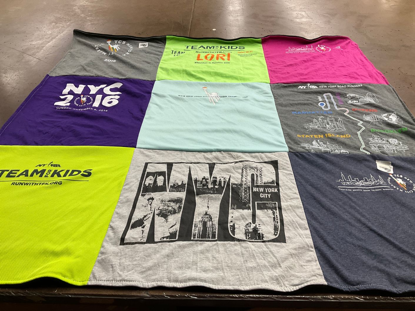 T-shirt quilt with running, charity themes by Lori from AL