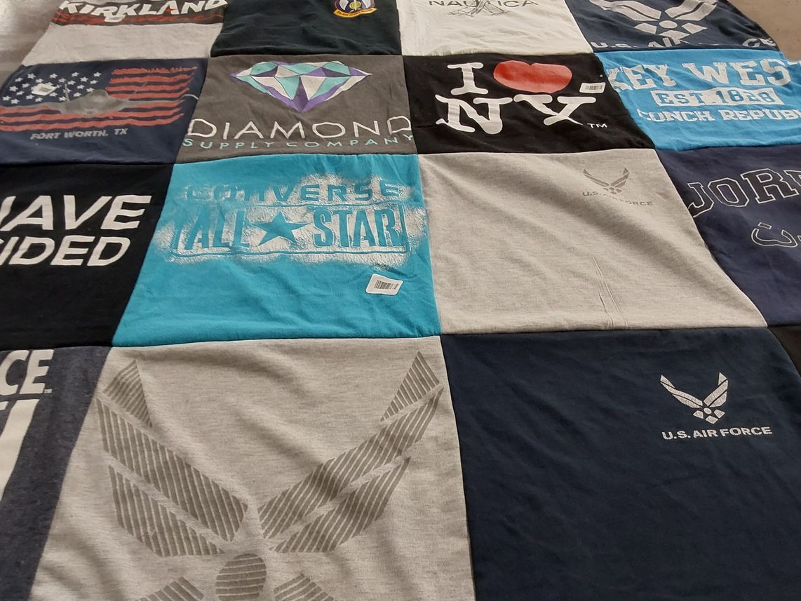 T-shirt quilt with travel, fashion themes by Betsabe from TX