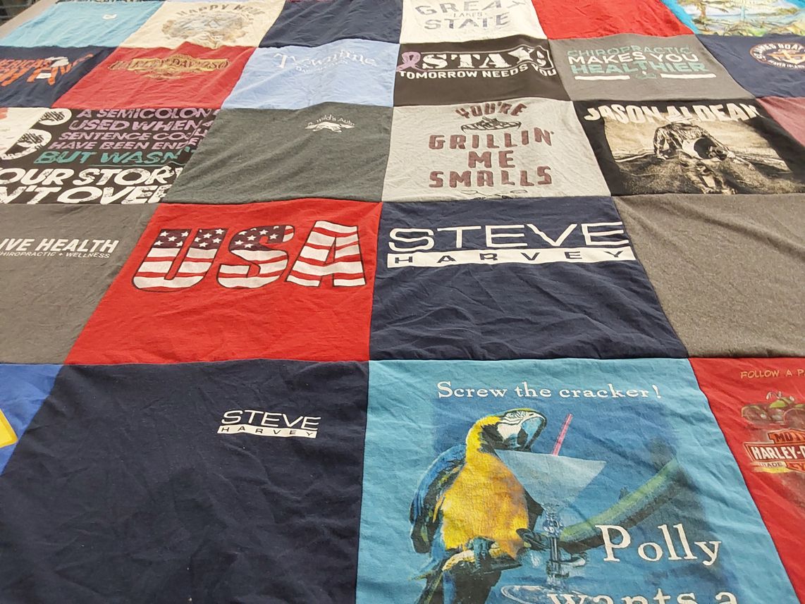 T-shirt quilt with health, comedy themes by Joann from MI