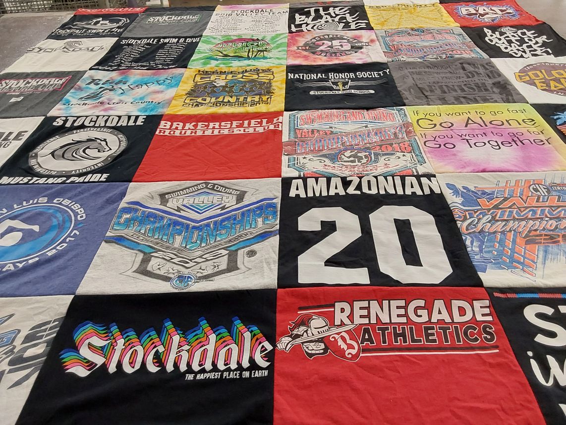 T-shirt quilt featuring renegade athletics by Laura from CA
