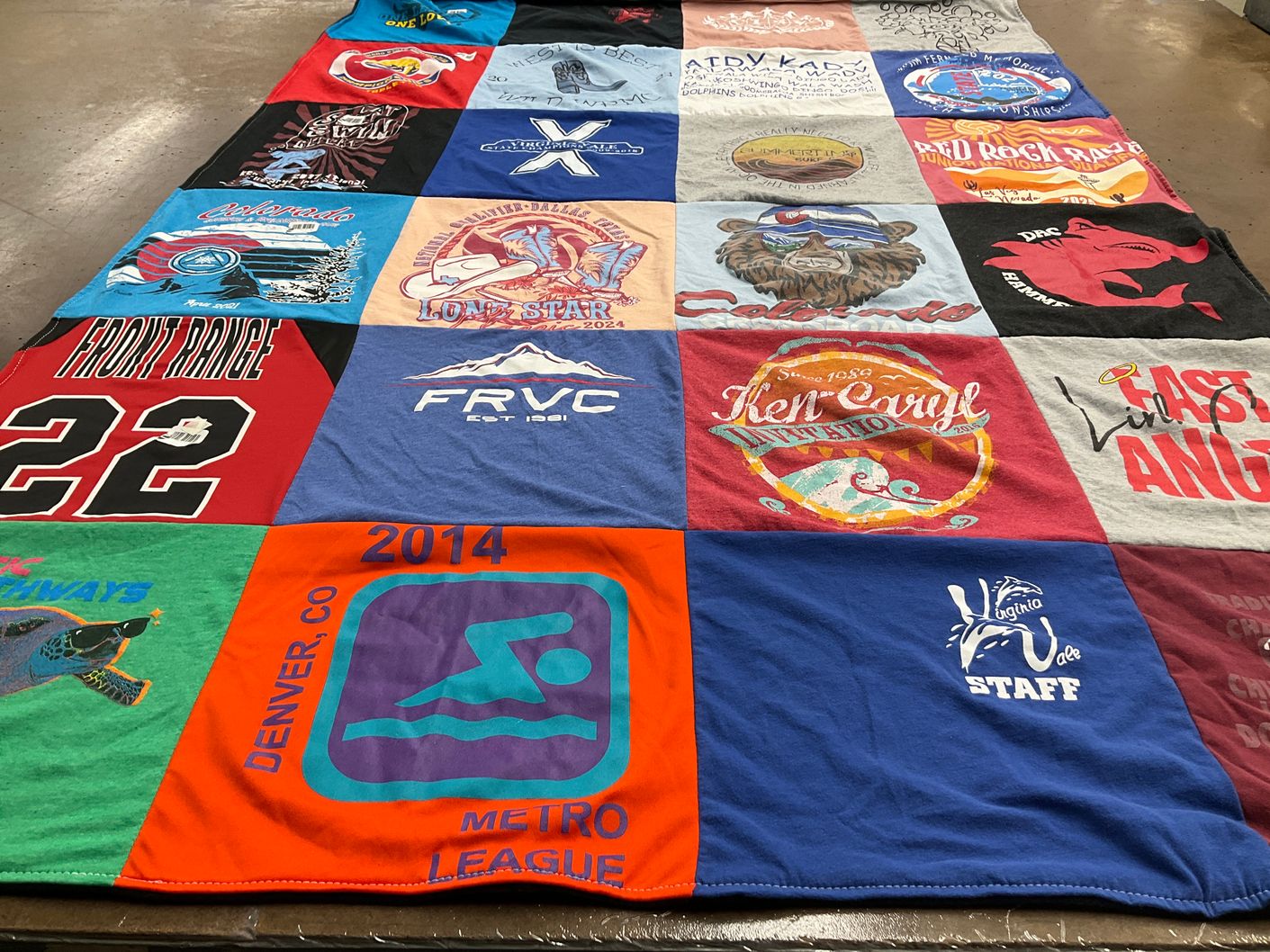 T-shirt quilt with swimming, sports themes by Pamela from CO