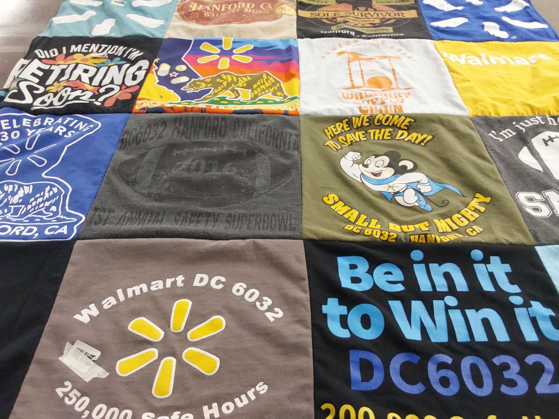 T-shirt quilt with retirement, safety themes by Donna from CA