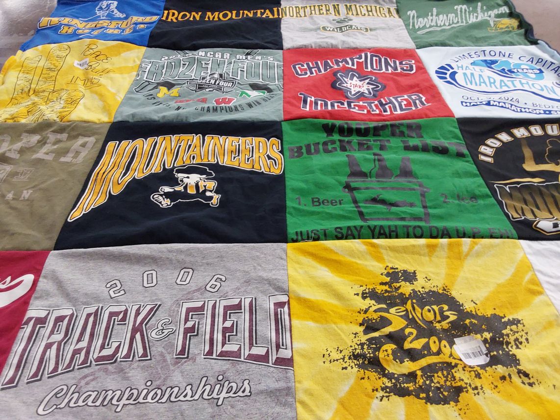 T-shirt quilt featuring northern michigan university wildcats by Grace from IN