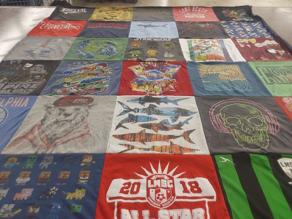 T-shirt quilt with video games, sci-fi themes by Mary from PA