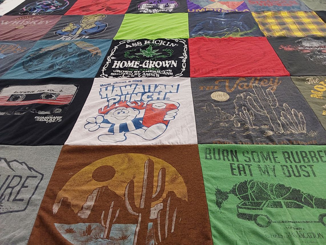 T-shirt quilt with music, drinks themes by Rachel from OH