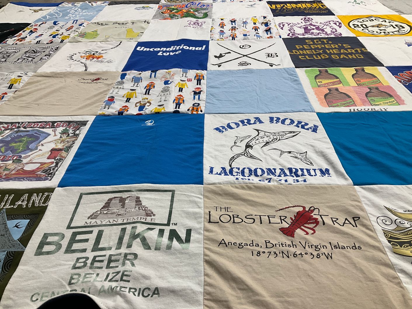 T-shirt quilt with travel, beer themes by thao from MT