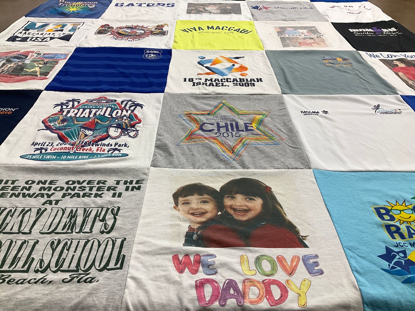 T-shirt quilt with sports, family themes by Wendy from FL