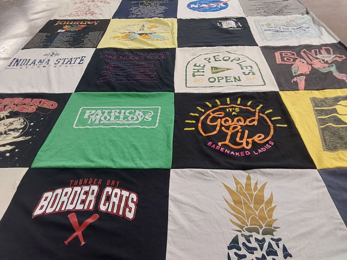 T-shirt quilt featuring border cats by Chris from IN
