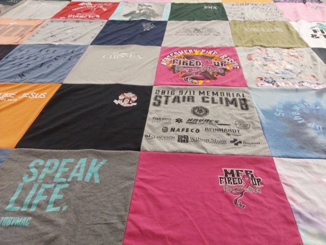 T-shirt quilt with community service, charity themes by Angela from AL