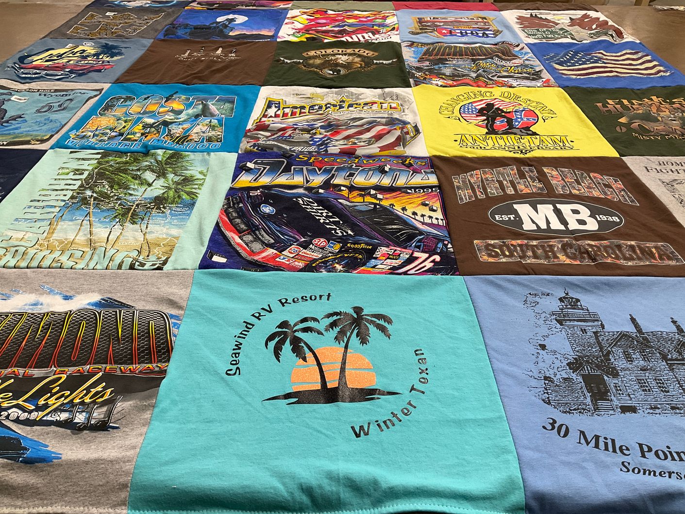 T-shirt quilt with travel, racing themes by Donna from VA