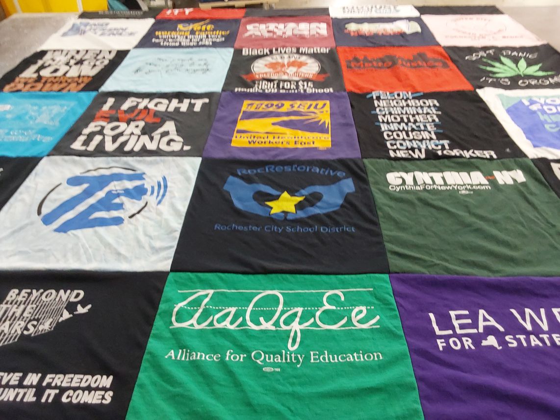 T-shirt quilt with social justice, education themes by Rosemary from NY