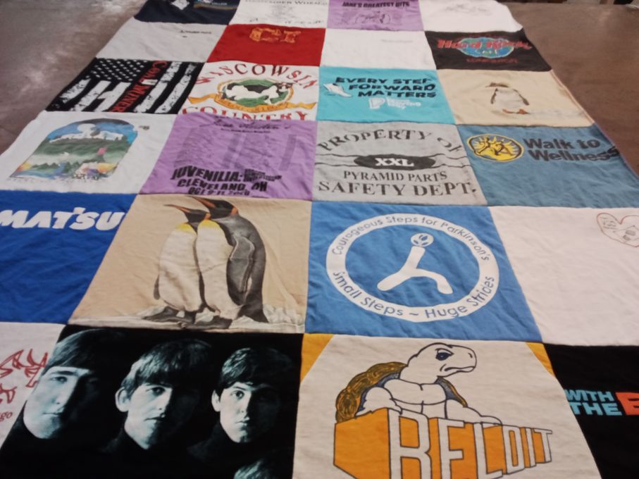 T-shirt quilt with music, environment themes by Nancy from OH