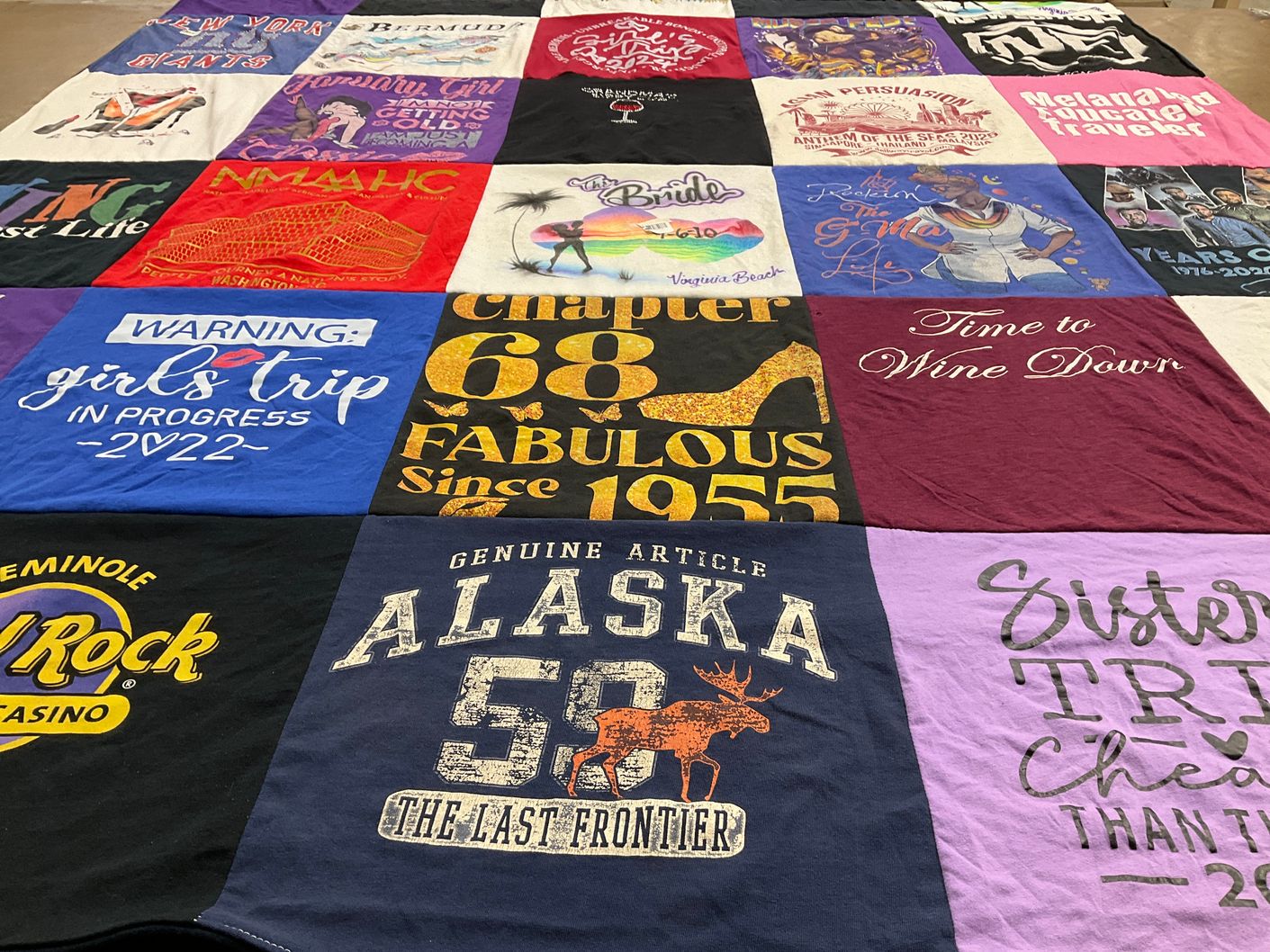 T-shirt quilt with travel, sisterhood themes by Janet from NY