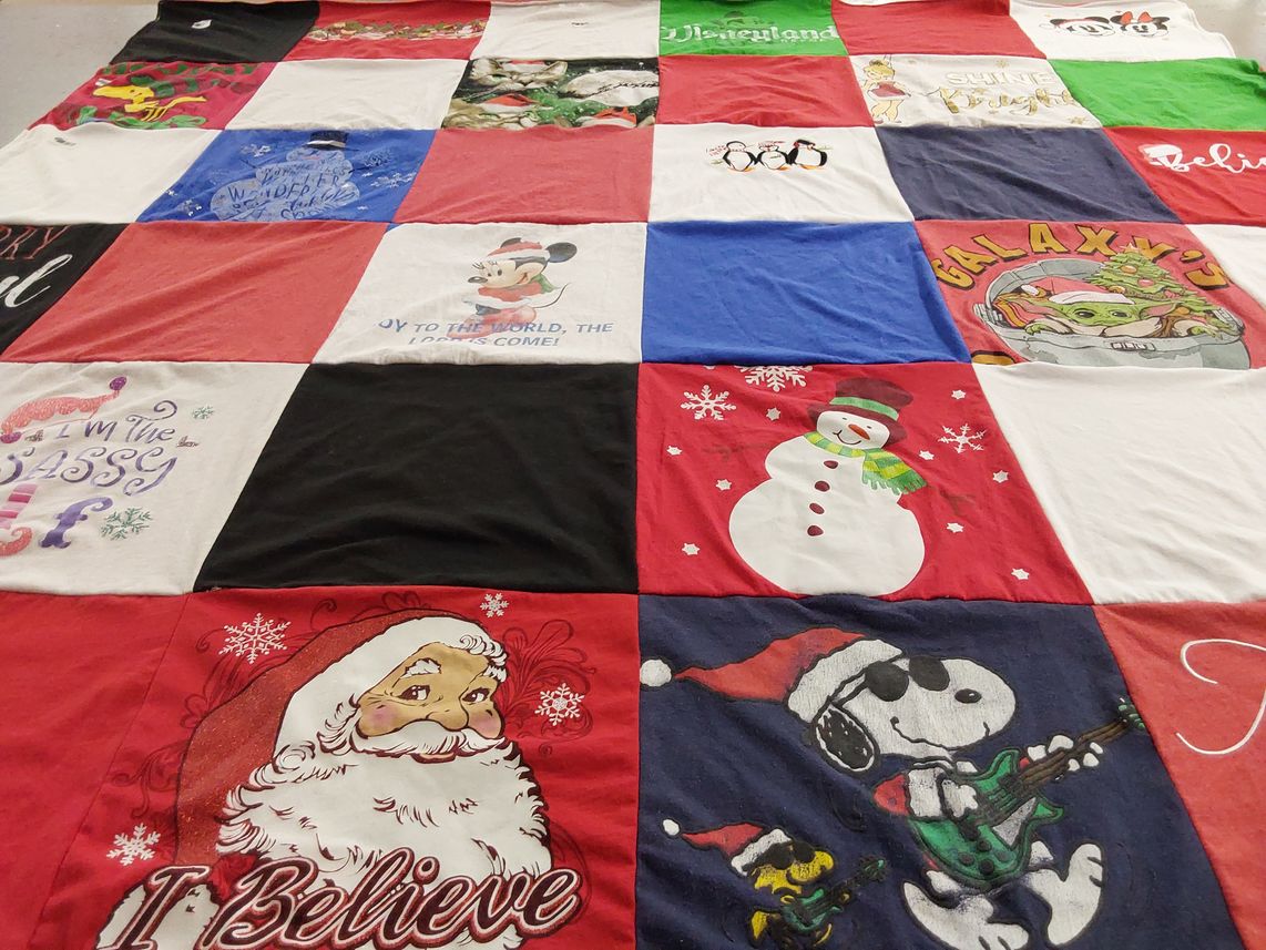 T-shirt quilt with disney, holiday themes by Kimberly from TX