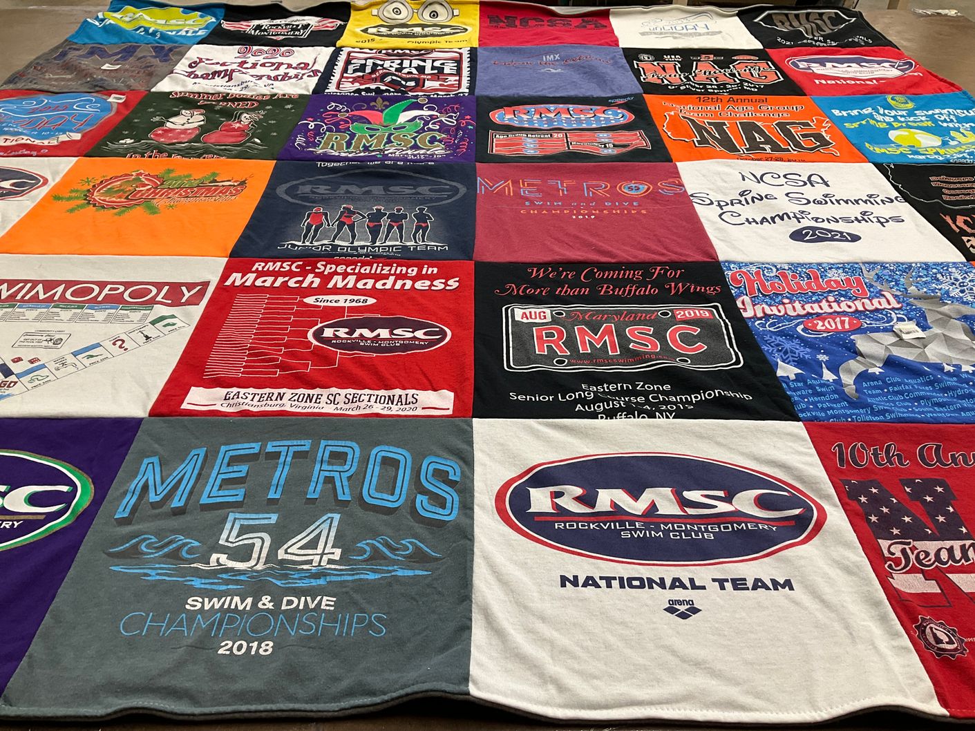 T-shirt quilt with swimming, sports themes by Catherine from MD