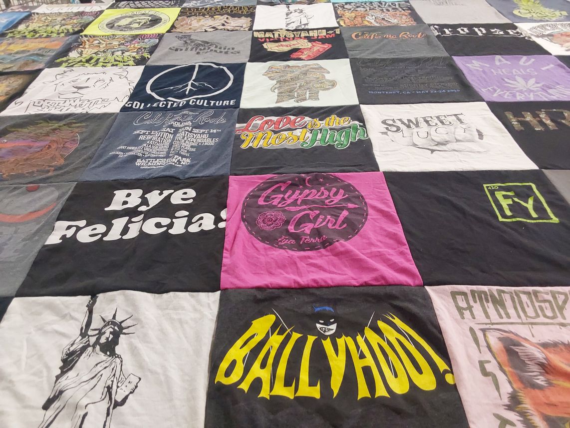 T-shirt quilt with music, culture themes by Adria from NJ