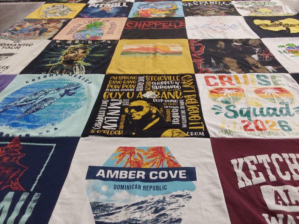 T-shirt quilt with travel, music themes by Rebecca from WA