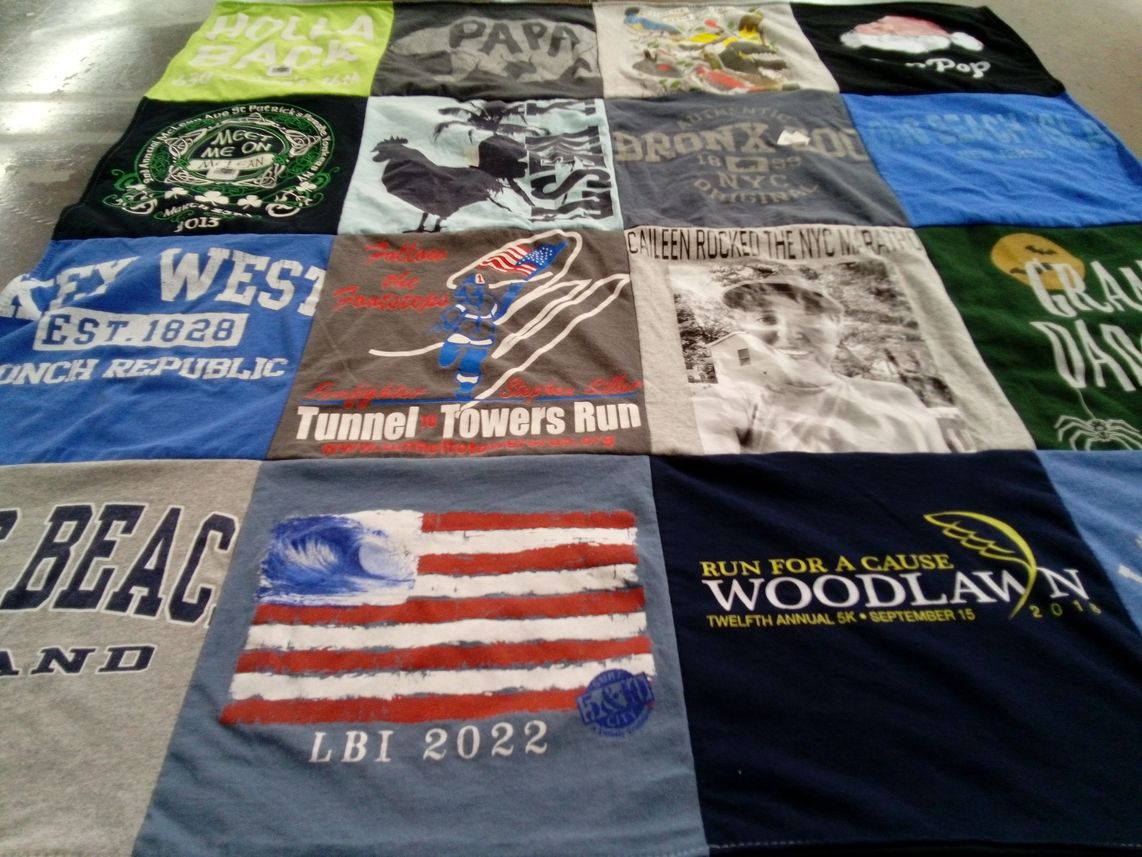 T-shirt quilt with running themes by Theresa from NY