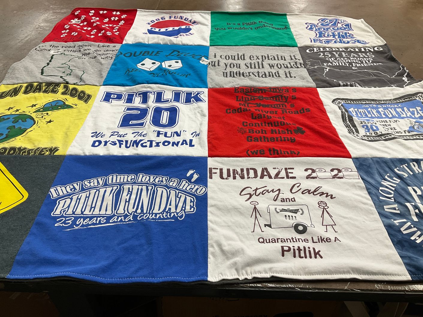 T-shirt quilt with fun, community gatherings themes by SUSAN from IA