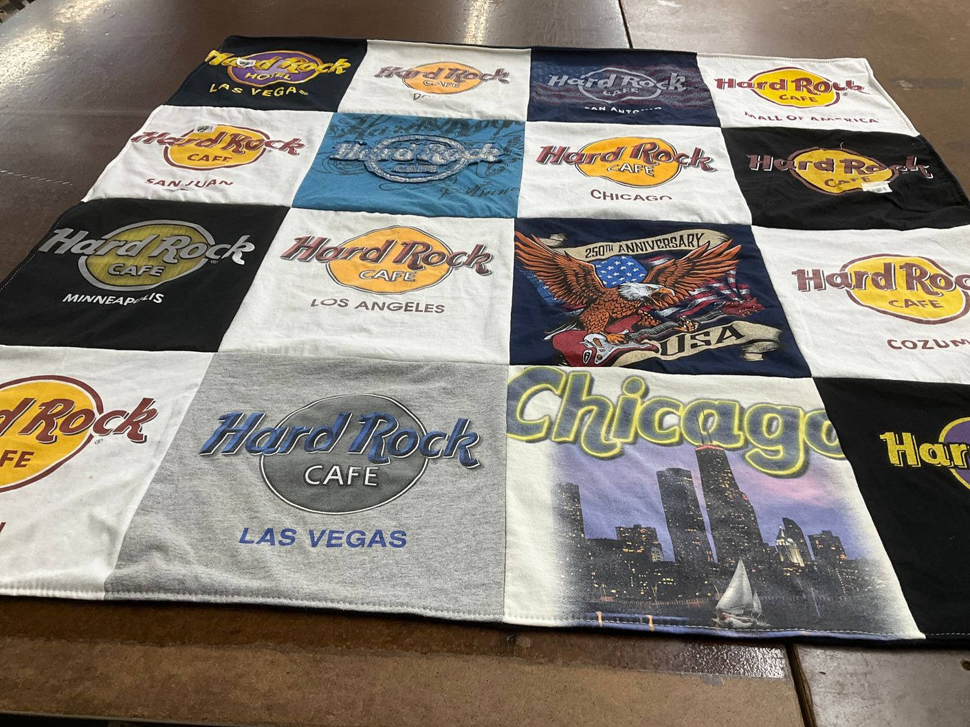 T-shirt quilt with music, travel themes by Lori from IA