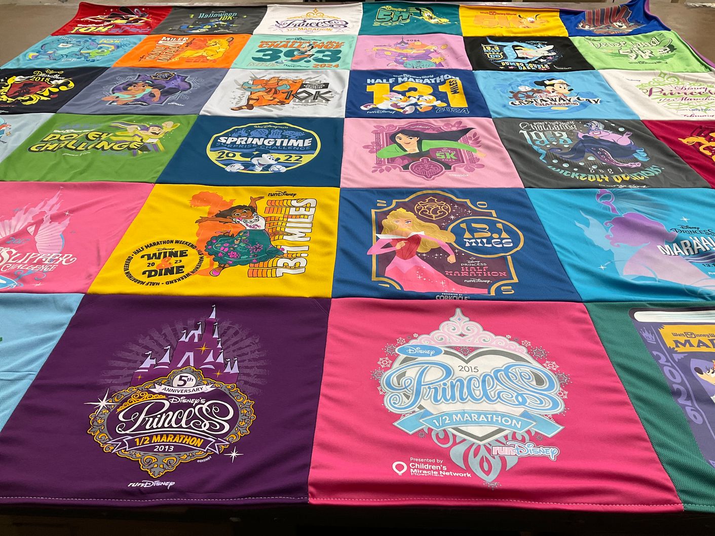 T-shirt quilt with disney, running themes by Amy from TX