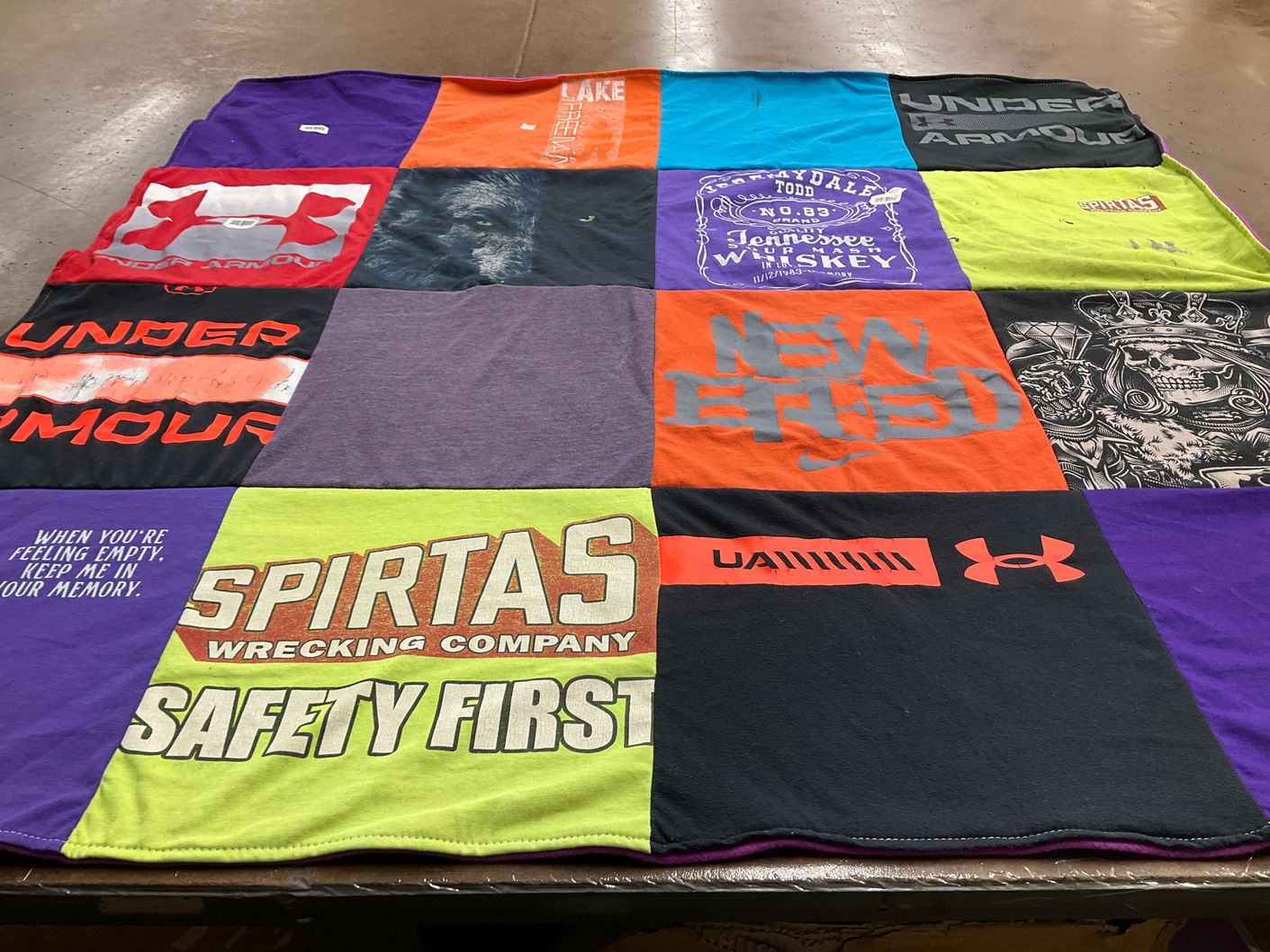 T-shirt quilt with whiskey themes by Martha from MO