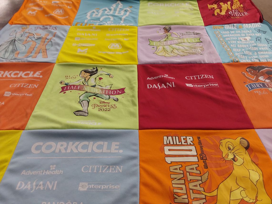 T-shirt quilt with running, disney themes by Erin from OH